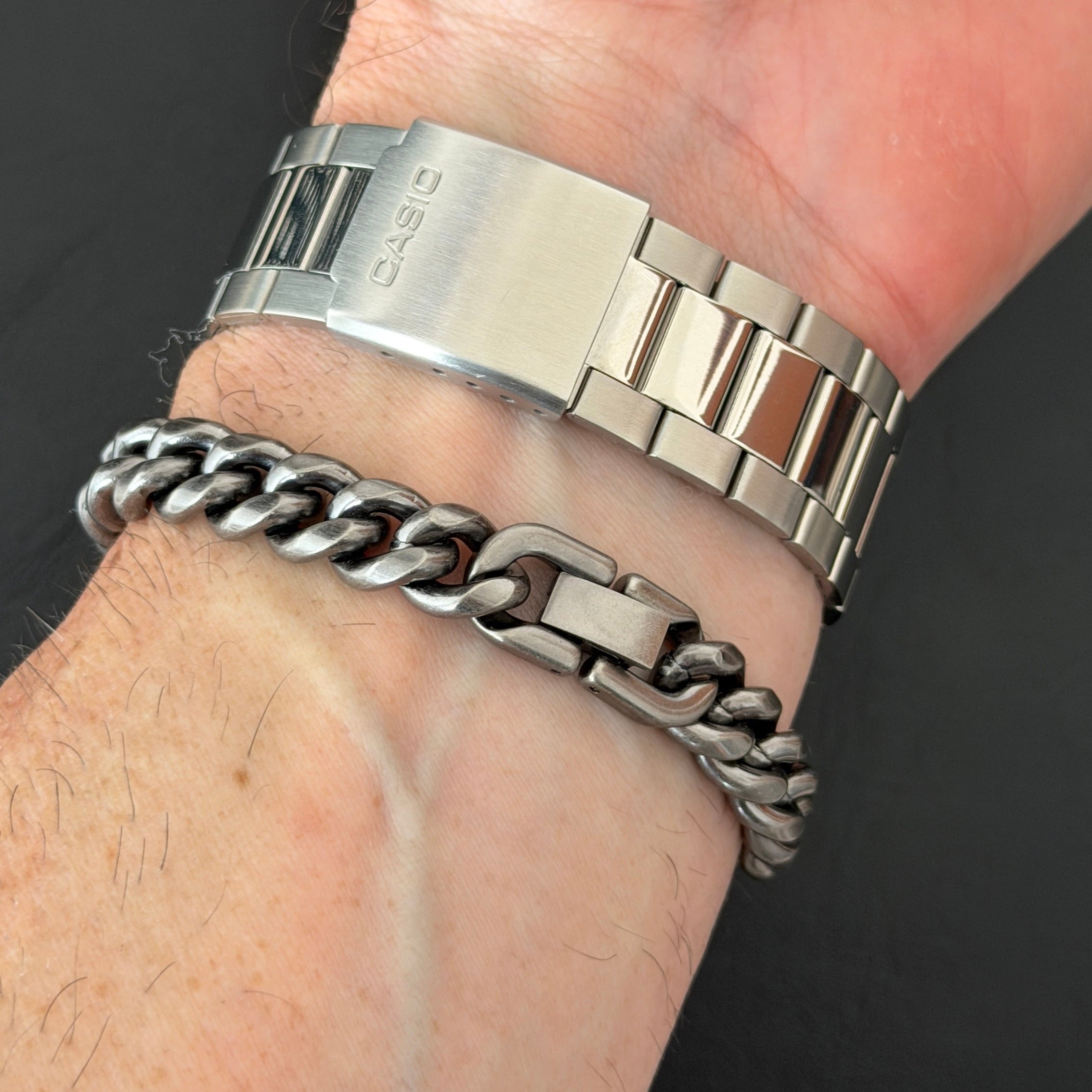 10mm steel bracelet on man's wist 